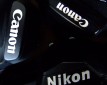 Какую фотокамеру приобрксти Canon или Nikon?
